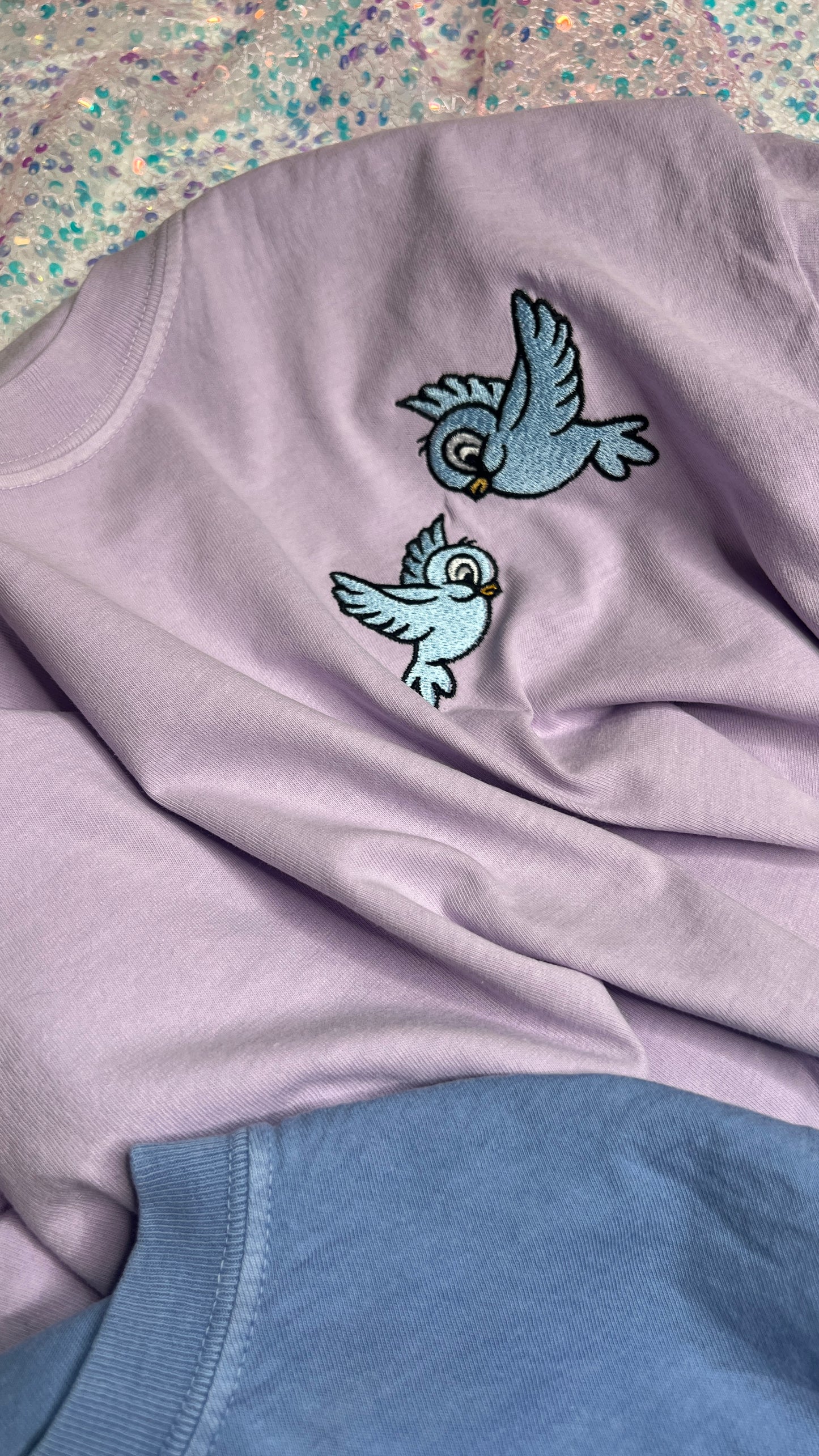 Light Purple princess birds ( DESIGN IS ON SIDE NOT CENTER!! ) short sleeve regular embroidered tshirt. !!! EST tat BEGINNING OF AUGUST ! ! NOT CROPPED !!!