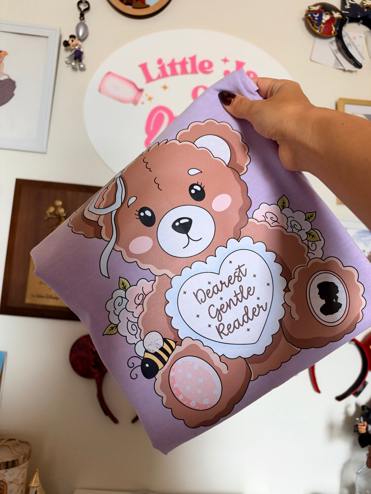 Light purple reader bear adult shirt. Press on image. Please allow 2-5 business days to ship.